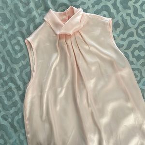 Light blush turtleneck blouse